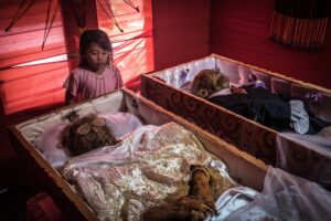 Dead Toraja couple in their room Photo. The Sun